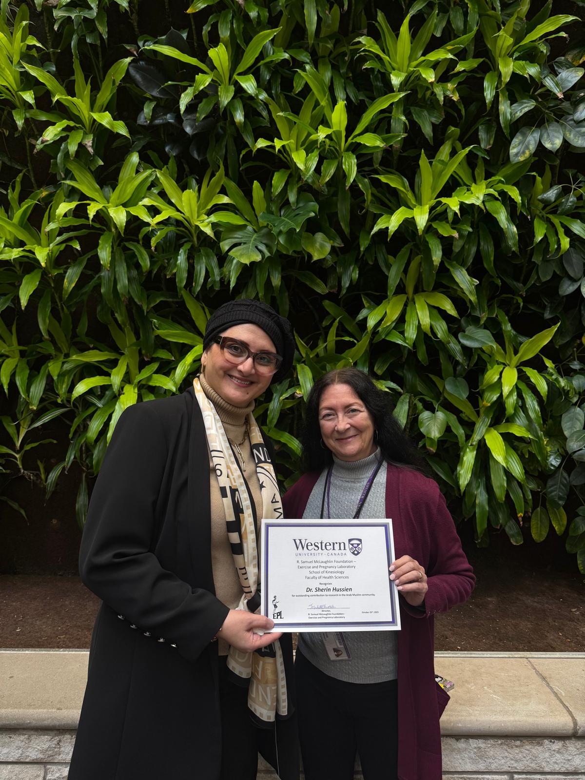Dr. Sherin Hussien receiving Western University recognition