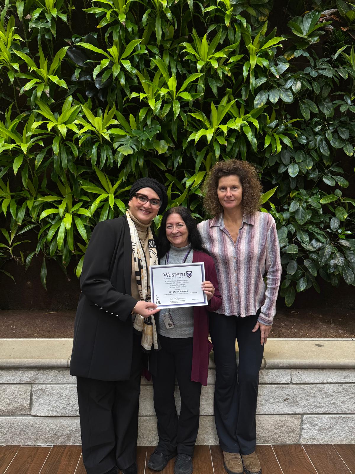 Dr. Sherin with Western University faculty