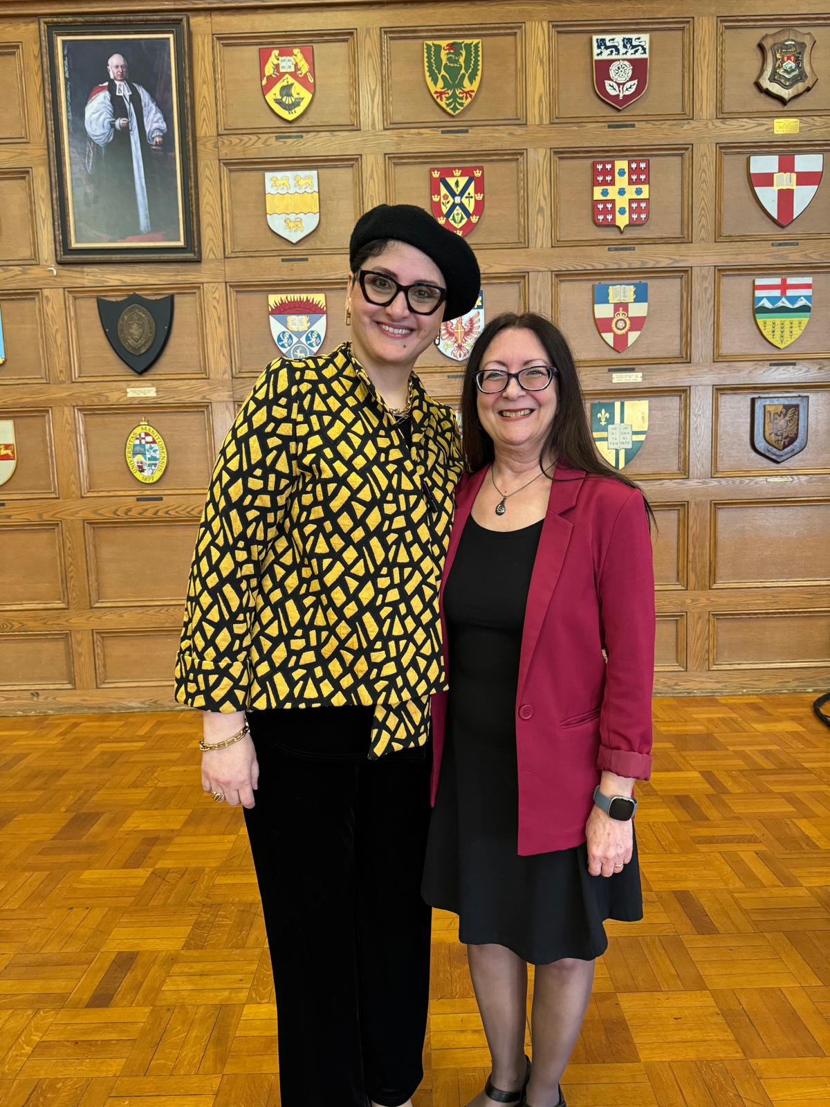 Dr. Sherin Hussien with a community member